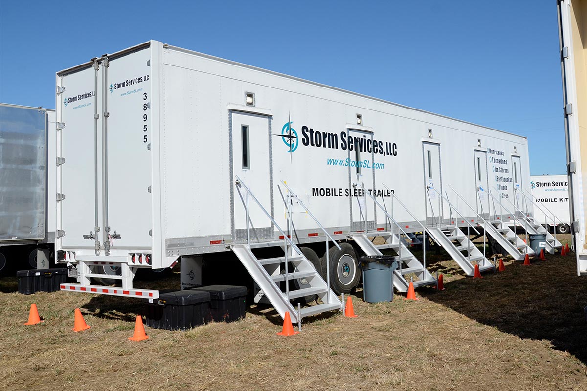 Mobile sleep trailers deployed at a base case.
